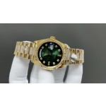 Sunday Calendar series women's watch, green dial, gold bezel, 36mm, with diamond-set gold President-style bracelet.